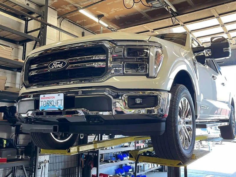 Load image into Gallery viewer, TorkLift Stainless Steel Front North-hitch with 2" Receiver — 2016-2026 Ford F-150 - TKL-X7913S - Absolute Autoguard