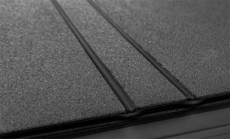 Load image into Gallery viewer, ACCESS LOMAX Hard Folding Tonneau Cover, 6'4" Bed, With RamBox and Silver Cargo Rails - 2014-2018 Ram 1500, 2019-2024 Ram 1500 Classic, 2012-2026 Ram 2500/3500
