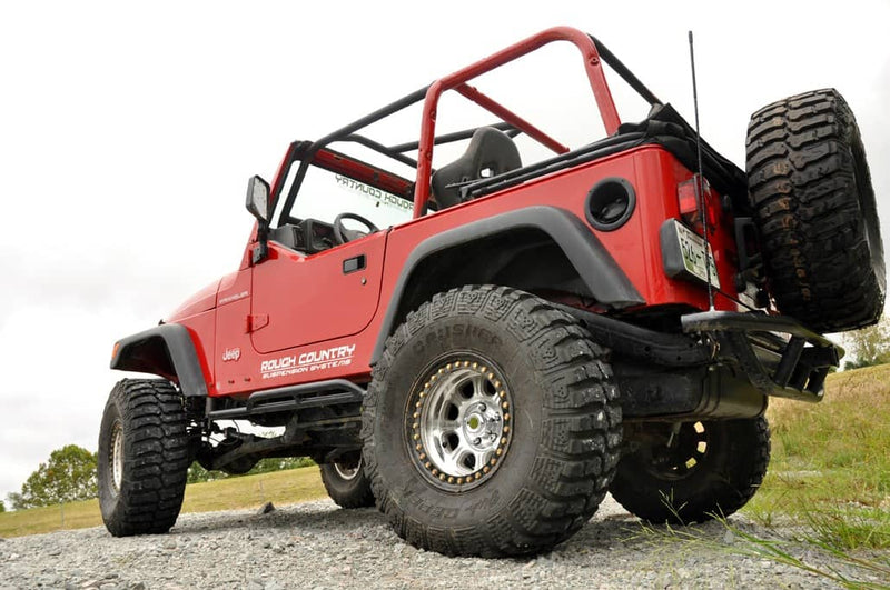 Load image into Gallery viewer, Rough Country 4 Inch Lift Kit, Long Arm, V2 - 1997-2006 Jeep Wrangler
