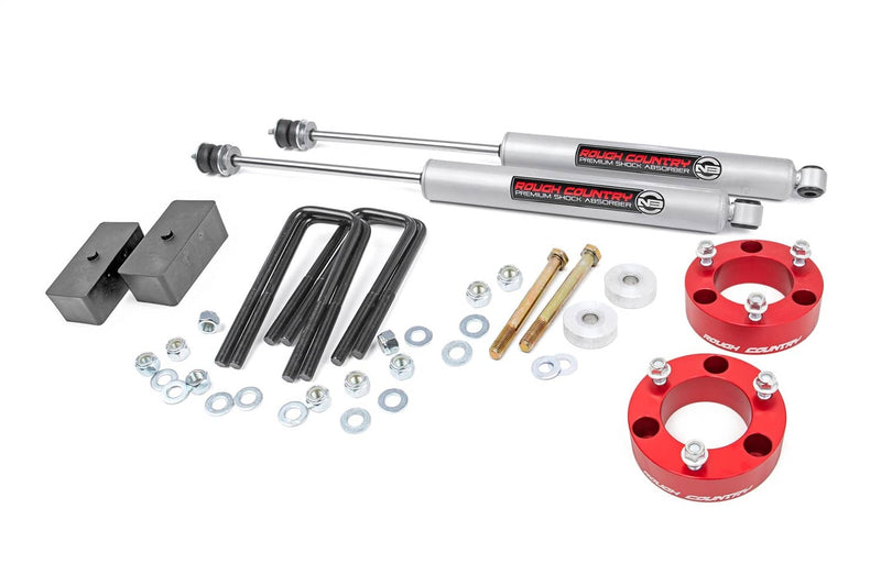 Load image into Gallery viewer, Rough Country 3 Inch Lift Kit, Red Spacer - 2005-2023 Toyota Tacoma
