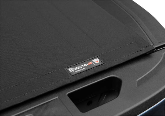 TruXedo Sentry CT Hard Roll-Up Tonneau Cover, Matte Black, 6'9" Bed, Without CarbonPro Bed - 2020-2026 Chevrolet Silverado 2500/3500, GMC Sierra 2500/3500
